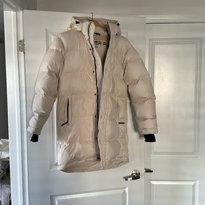 GUC TNA super puff in oyster pearl size L. Mid length. Some small stains.